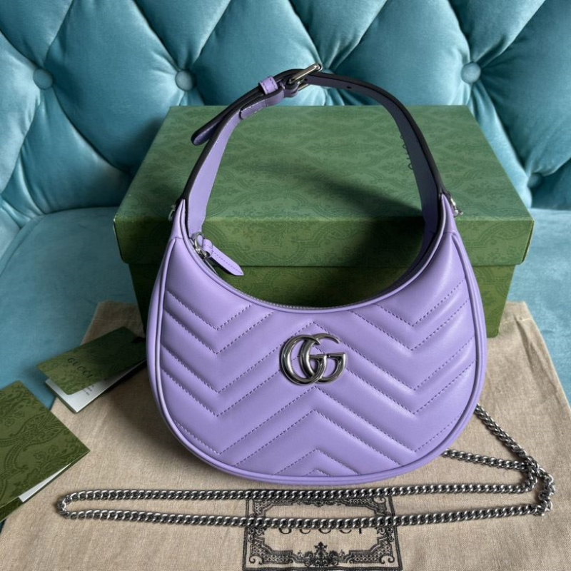 G*u*i top handle bags